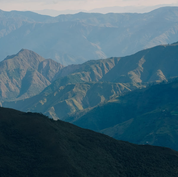 Ecuadorian Andes Mountain range with varying shades of blue and green