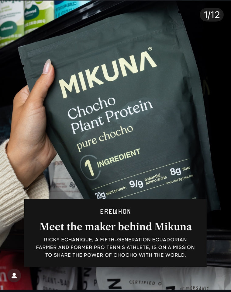 A MIKUNA Chocho Plant Protein bag held up in an Erewhon aisle