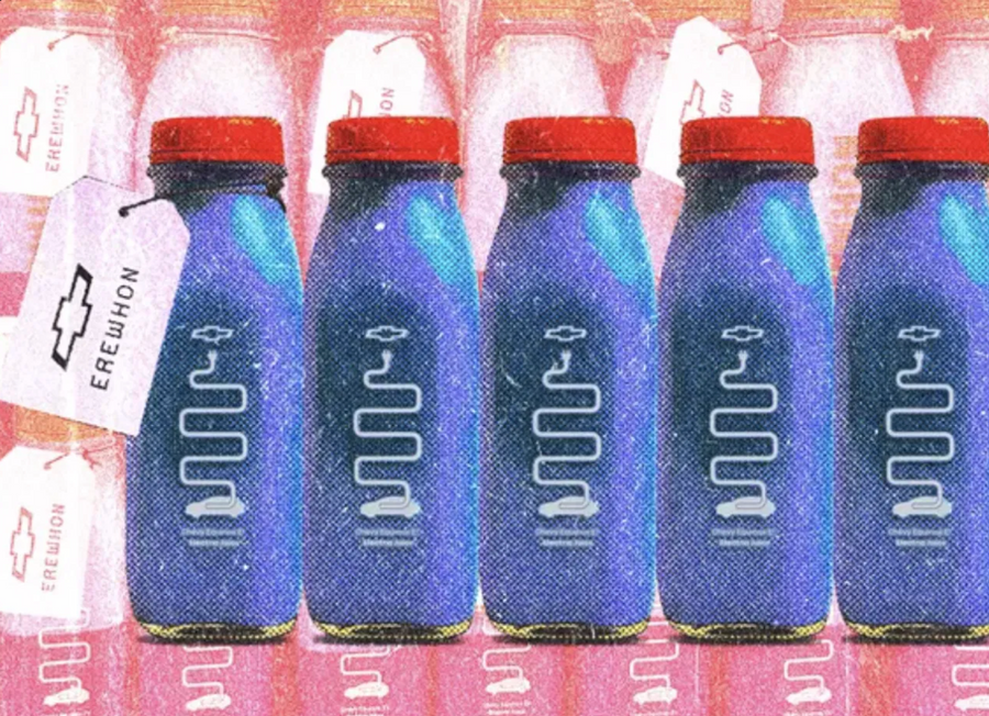 Bottles of Equinox EV Electric Juice with Erewhon and Chevrolet hang tags